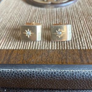 Vintage Anson marked gold tone center starburst with rhinestone cuff links